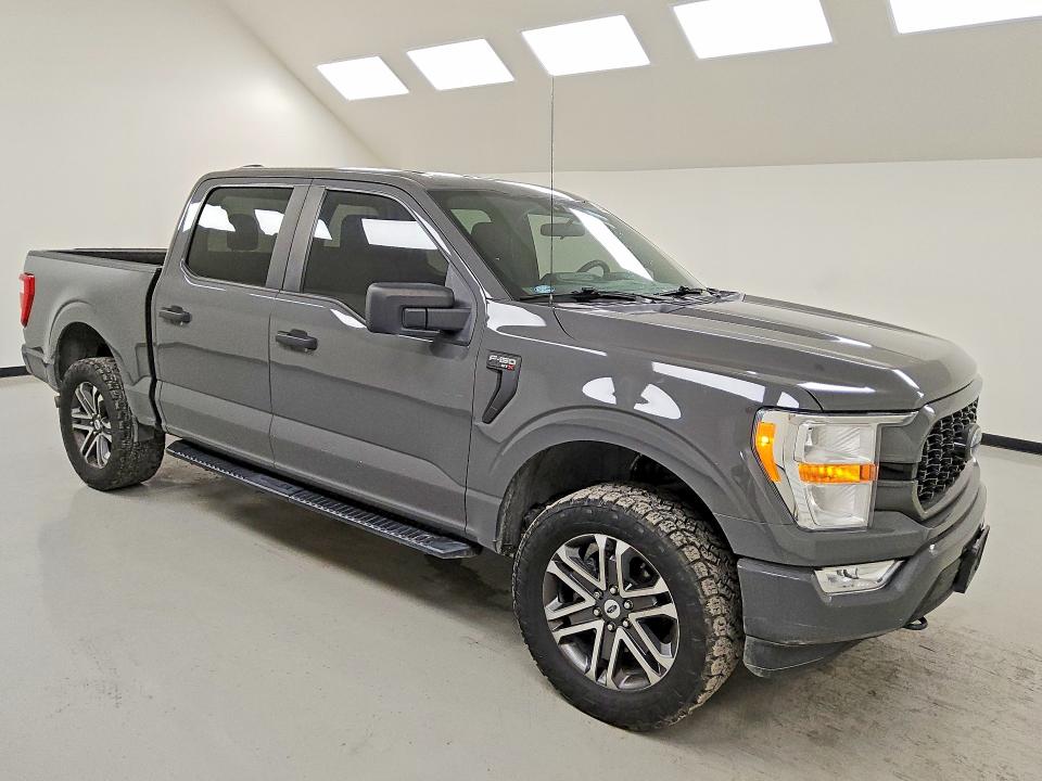 2021 Ford F-150 lightning VIN 1FTFW1E52MKD65101 COPART salvage auction — MINOR DENT/SCRATCHES, TX - CERTIFICATE OF TITLE, sold $14,600 on 2026-07-23 (photo 4)
