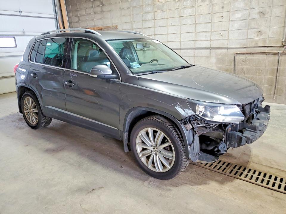 2014 Volkswagen Tiguan VIN WVGBV3AX1EW536530 COPART salvage auction — FRONT END, MN - CERT OF TITLE-PRIOR SALVAGE, sold $525 on 2026-08-06 (photo 4)