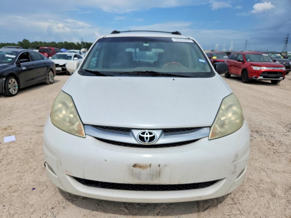 2006 Toyota Sienna VIN 5TDZA22C86S490944 COPART salvage auction — MINOR DENT/SCRATCHES, TX - CERT OF TITLE-REBUILT SALVAGE, sold $1,800 on 2026-07-17 (photo 5)