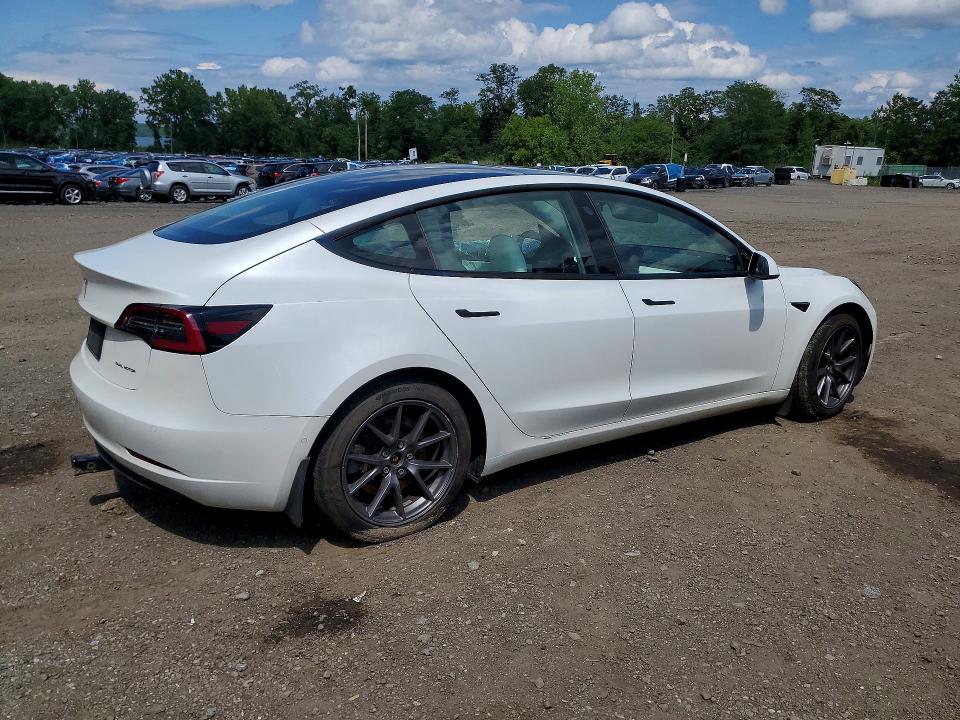 2021 Tesla Model 3 VIN 5YJ3E1EB1MF925215 COPART salvage auction — SIDE, Ny - Mv-907A Salvage Certificate, sold $1,050 on 2026-07-28 (photo 3)