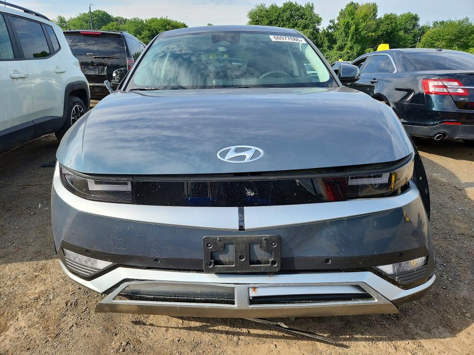 2023 Hyundai Ioniq 5 VIN KM8KNDAF2PU141431 COPART salvage auction — ALL OVER, CT - CERT OF TITLE-SALVAGE, sold $5,000 on 2026-07-23 (photo 5)