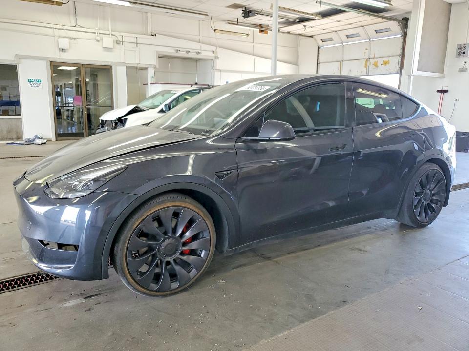 2024 Tesla Model y VIN 7SAYGDEF5RA330539 COPART salvage auction — FRONT END, Id - Cert Of Title -Rebuilt Salvage (P), sold $13,000 on 2026-07-17 (photo 1)