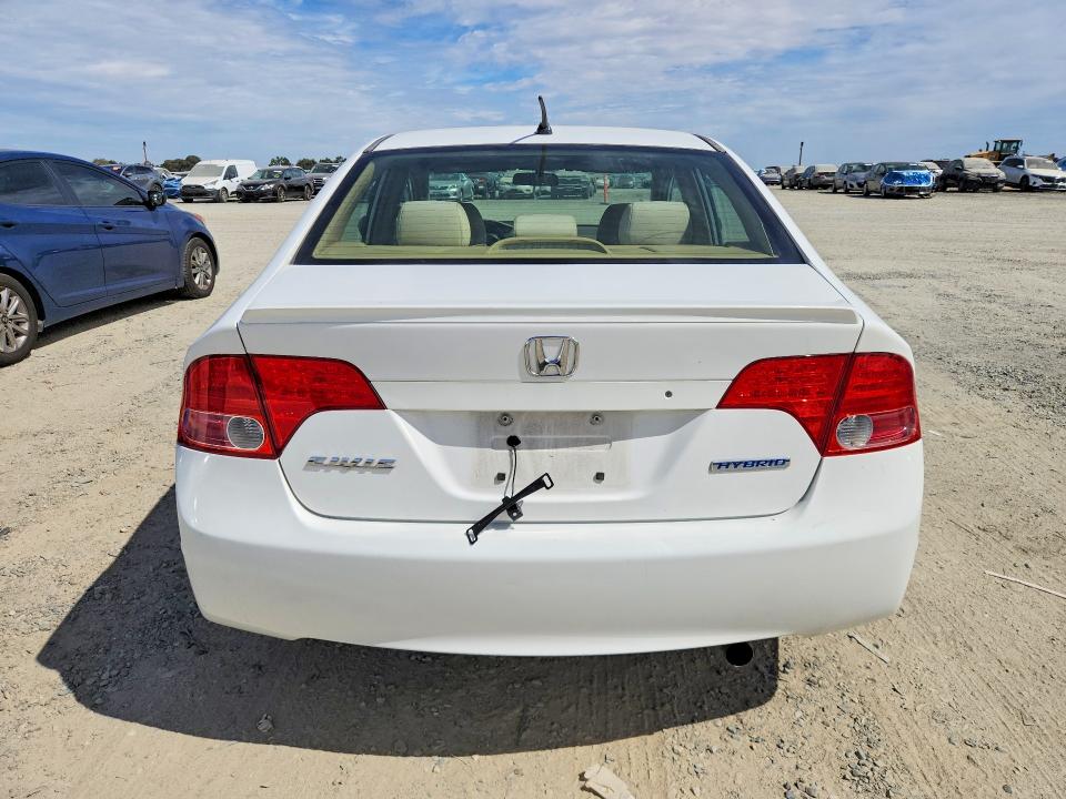 2006 Honda Civic hybrid VIN JHMFA36276S012983 COPART salvage auction — MINOR DENT/SCRATCHES, Ca - Dis/Dlr/Exp Only Clean Title, sold $375 on 2026-07-30 (photo 6)