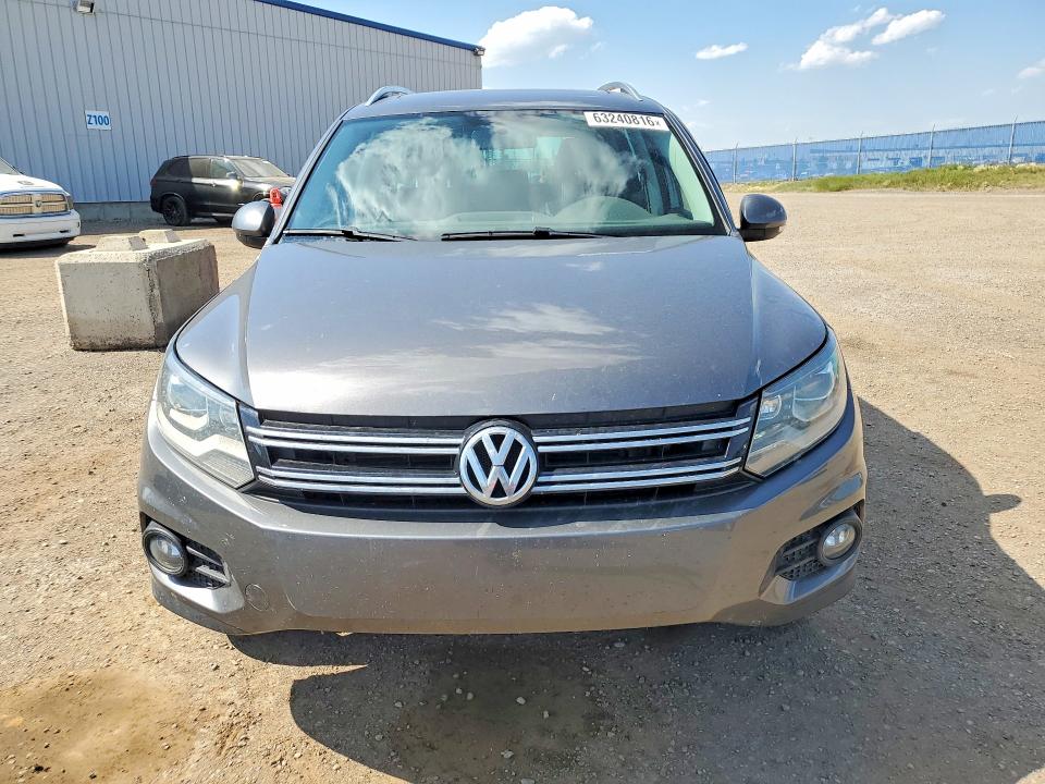 2015 Volkswagen Tiguan VIN WVGJV7AX7FW544216 COPART salvage auction — SIDE, AB - OOP - SALVAGE, sold $3,100 on 2026-08-04 (photo 5)