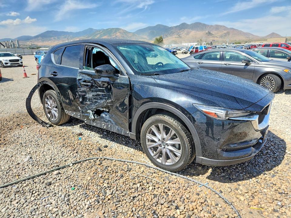2019 Mazda Cx-5 VIN JM3KFBDY9K0663404 COPART salvage auction — SIDE, Salvage Title, sold $6,100 on 2026-08-21 (photo 4)