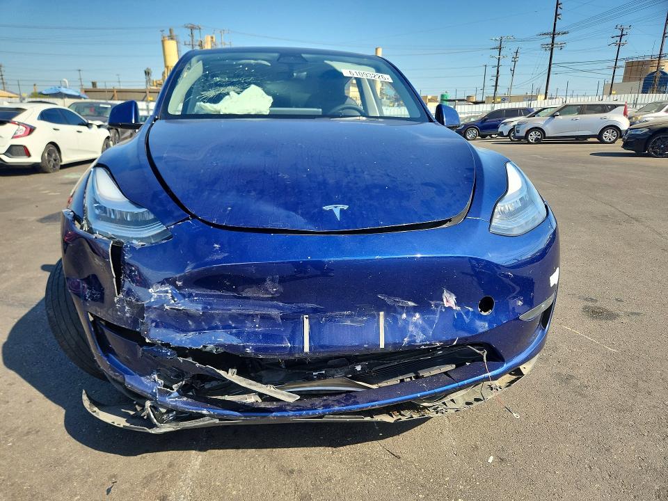 2023 Tesla Model y VIN 7SAYGDEE1PA124414 COPART salvage auction — FRONT END, CA - SALVAGE CERTIFICATE, sold $4,850 on 2026-07-27 (photo 5)