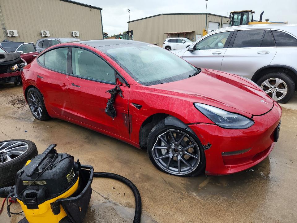 2022 Tesla Model 3 VIN 5YJ3E1EB6NF287545 COPART salvage auction — SIDE, TX - CERTIFICATE OF TITLE, sold $7,200 on 2026-07-27 (photo 4)