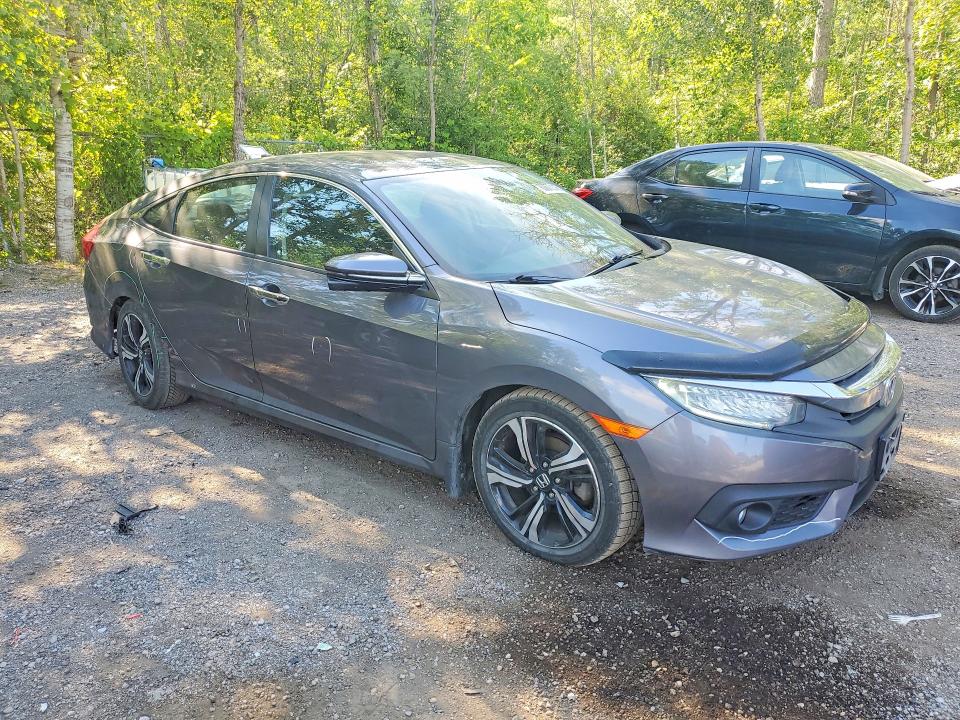 2016 Honda Civic VIN 2HGFC1F95GH109994 COPART salvage auction — SIDE, ON - PERMIT NO BRAND - UNFIT, sold $4,750 on 2026-07-28 (photo 4)