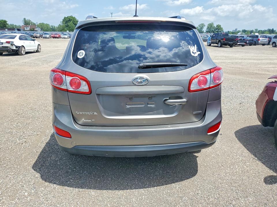 2012 Hyundai Santa fe VIN 5XYZGDAB1CG093748 COPART salvage auction — MINOR DENT/SCRATCHES, On - Permit No Brand - Unfit, sold $250 on 2026-07-21 (photo 6)