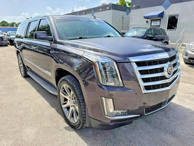 2015 Cadillac Escalade VIN 1GYS4HKJXFR170768 COPART salvage auction — MINOR DENT/SCRATCHES, Fl - Certificate Of Title (P), sold $11,700 on 2026-07-24 (photo 4)