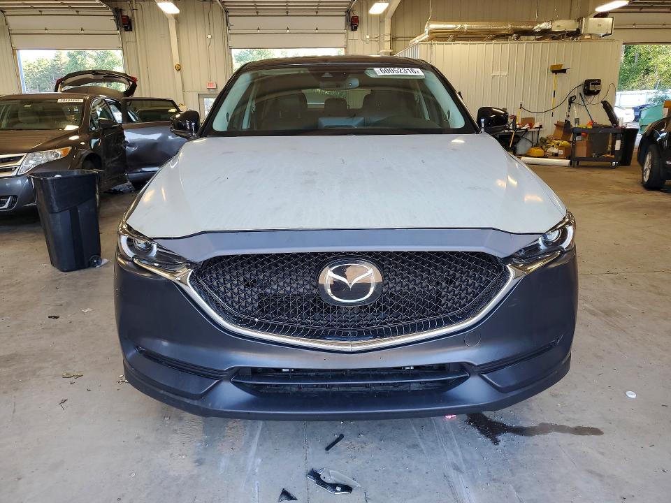 2021 Mazda Cx-5 VIN JM3KFACMXM1394822 COPART salvage auction — SIDE, Salvage Title, sold $4,000 on 2026-07-09 (photo 5)