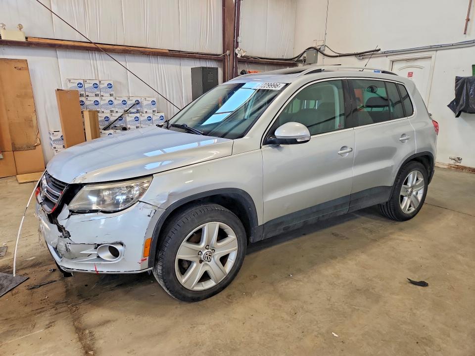 2011 Volkswagen Tiguan VIN WVGBV7AX4BW538730 COPART salvage auction — FRONT END, AB - OOP - ACTIVE, sold $400 on 2026-08-13 (photo 1)