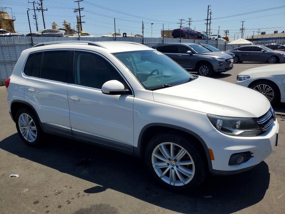 2012 Volkswagen Tiguan VIN WVGAV7AX5CW606224 COPART salvage auction — MINOR DENT/SCRATCHES, Ca - Dis/Dlr/Exp Only Clean Title (P), sold $600 on 2026-07-22 (photo 4)