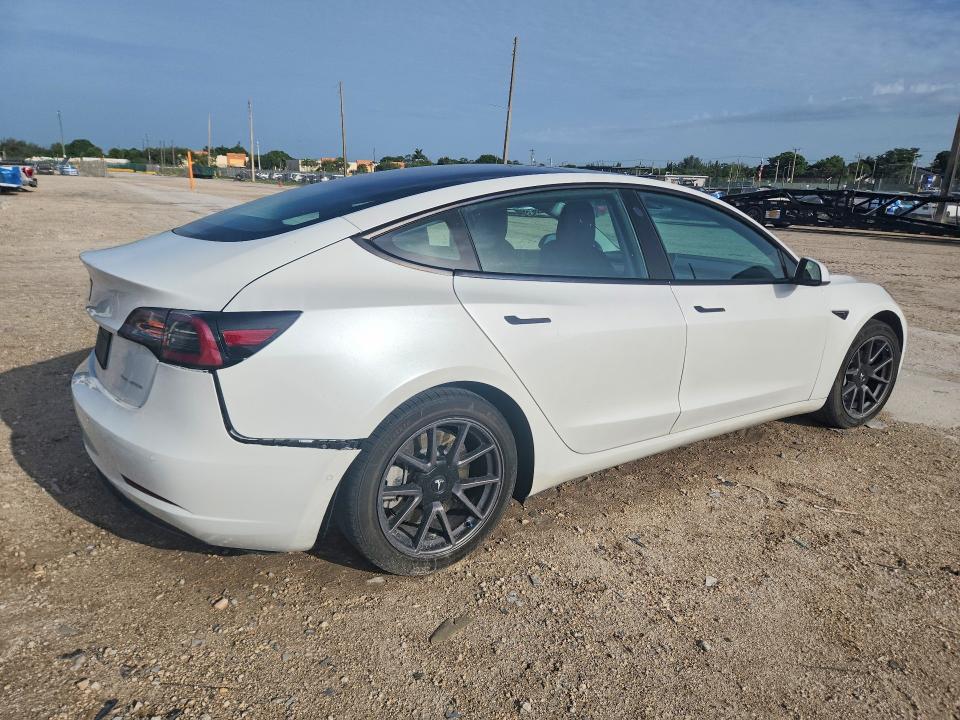 2021 Tesla Model 3 VIN 5YJ3E1EBXMF915038 COPART salvage auction — REAR END, Fl - Cert Of Title Slvg Rebuildable, sold $6,200 on 2026-07-28 (photo 3)