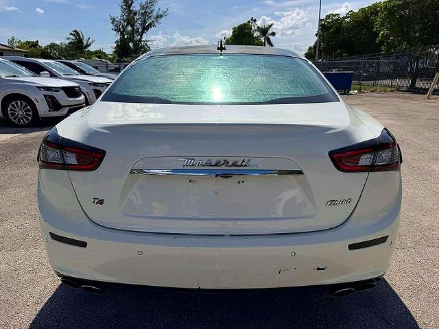 2014 Maserati Ghibli VIN ZAM57RTA9E1086058 COPART salvage auction — MINOR DENT/SCRATCHES, In - Certificate Of Title (P), sold $5,400 on 2026-08-04 (photo 6)