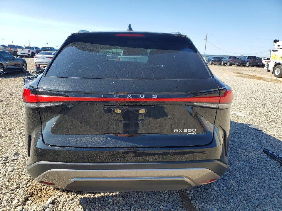 2023 Lexus Rx VIN 2T2BAMCA4PC022175 COPART salvage auction — FRONT END, TX - SALVAGE VEHICLE TITLE, sold $24,300 on 2026-09-22 (photo 6)