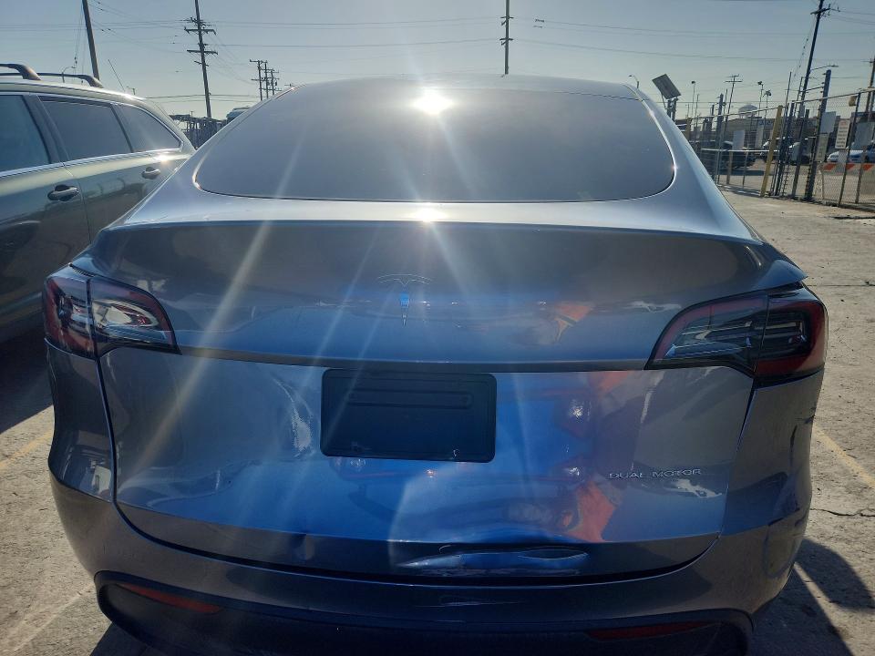 2025 Tesla Model y VIN 7SAYGDEE7SF240633 COPART salvage auction — SIDE, Ca - Salvage Certificate, sold $15,700 on 2026-08-24 (photo 6)