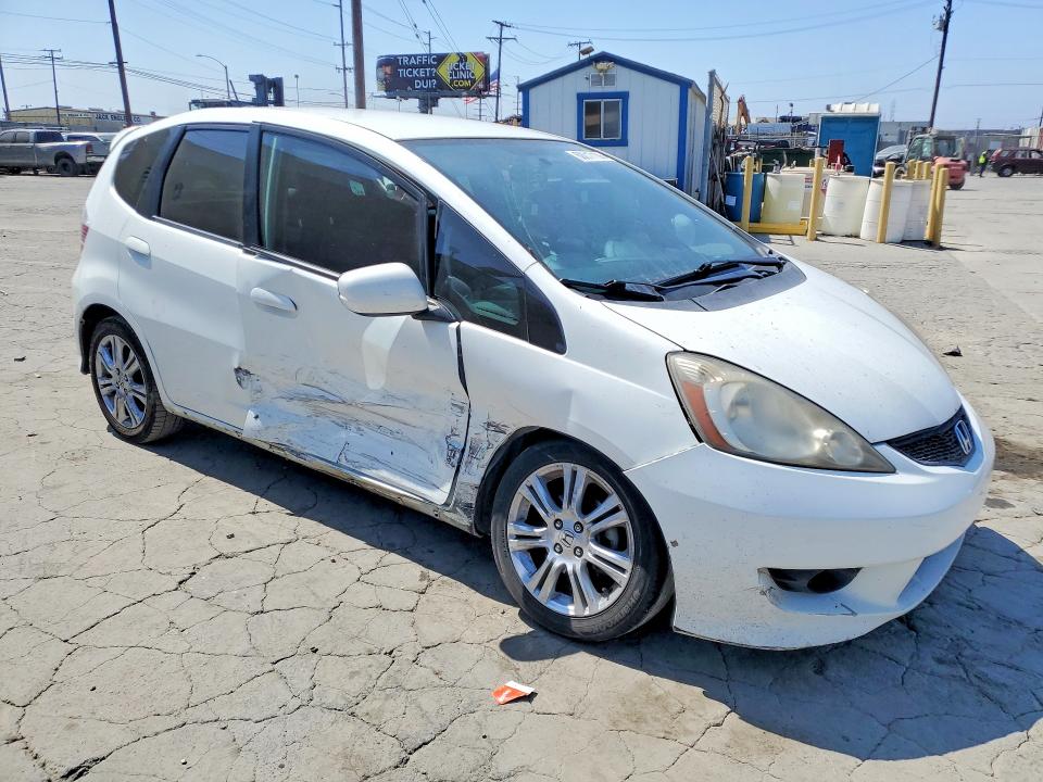 2011 Honda Fit VIN JHMGE8H54BC018015 COPART salvage auction — SIDE, Ca - Salvage Certificate, sold $900 on 2026-07-30 (photo 4)