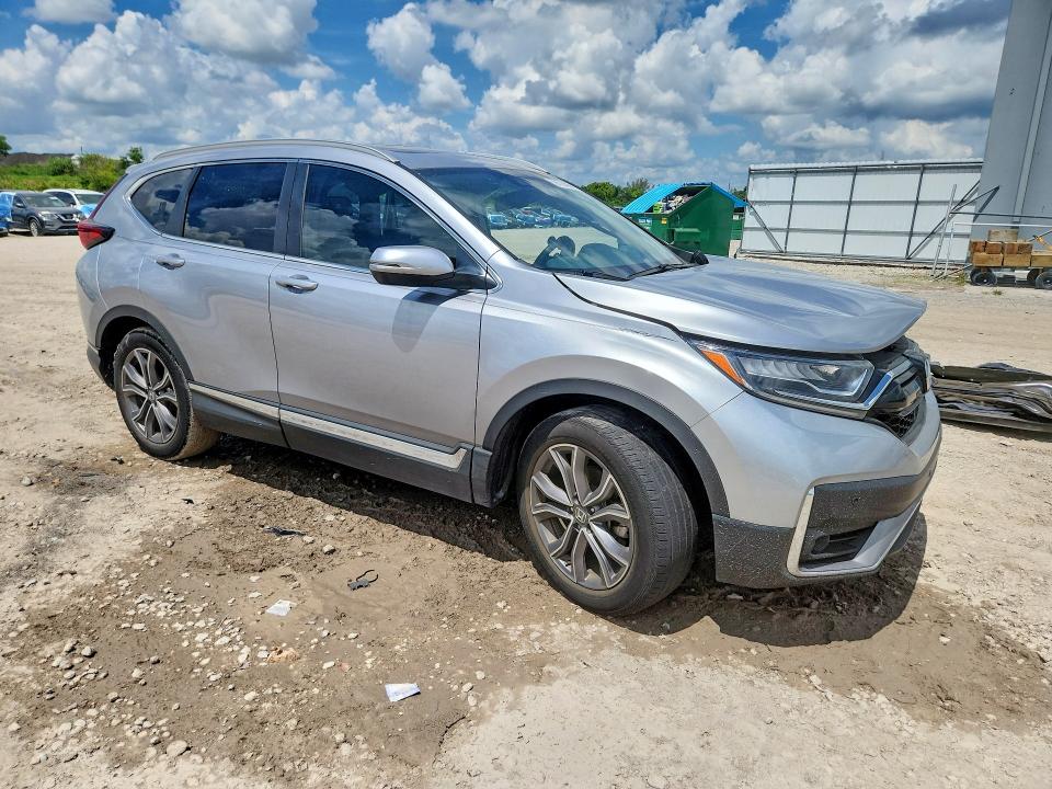 2021 Honda Cr-v VIN 7FARW1H99ME005207 COPART salvage auction — SIDE, Fl - Cert Of Title Slvg Rebuildable, sold $1,100 on 2026-07-28 (photo 4)