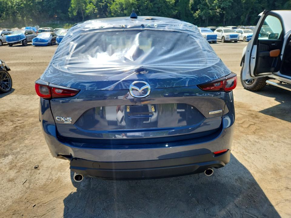 2025 Mazda Cx-5 VIN JM3KFBCM9S0677124 COPART salvage auction — ALL OVER, FL - CERTIFICATE OF DESTRUCTION, sold $350 on 2026-07-28 (photo 6)
