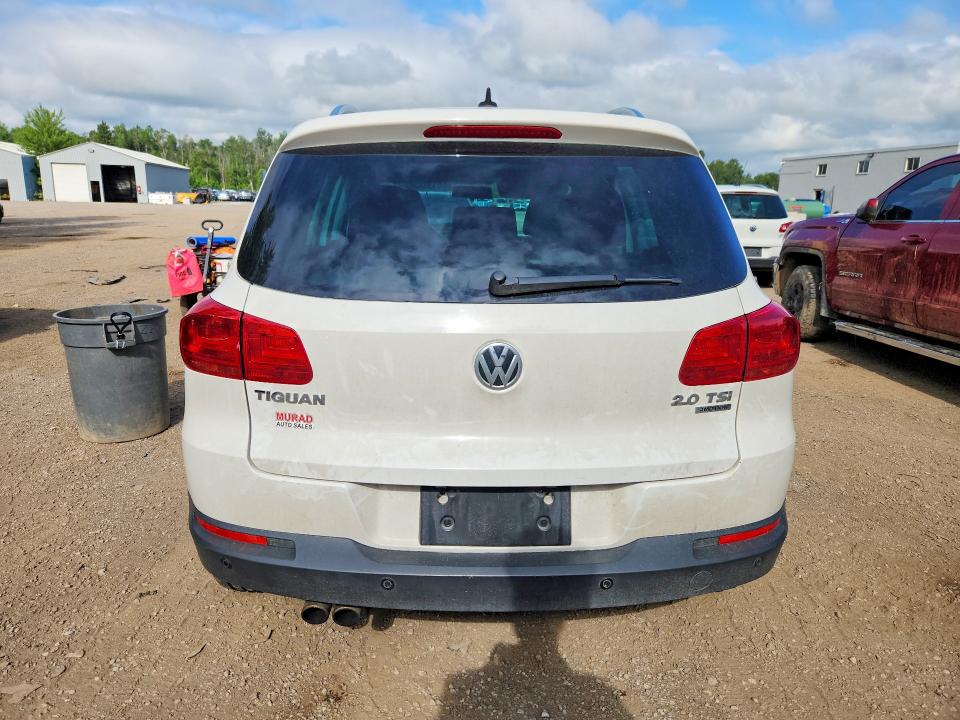 2012 Volkswagen Tiguan VIN WVGBV7AX4CW604498 COPART salvage auction — MINOR DENT/SCRATCHES, On - Permit No Brand - Unfit, sold $425 on 2026-07-29 (photo 6)