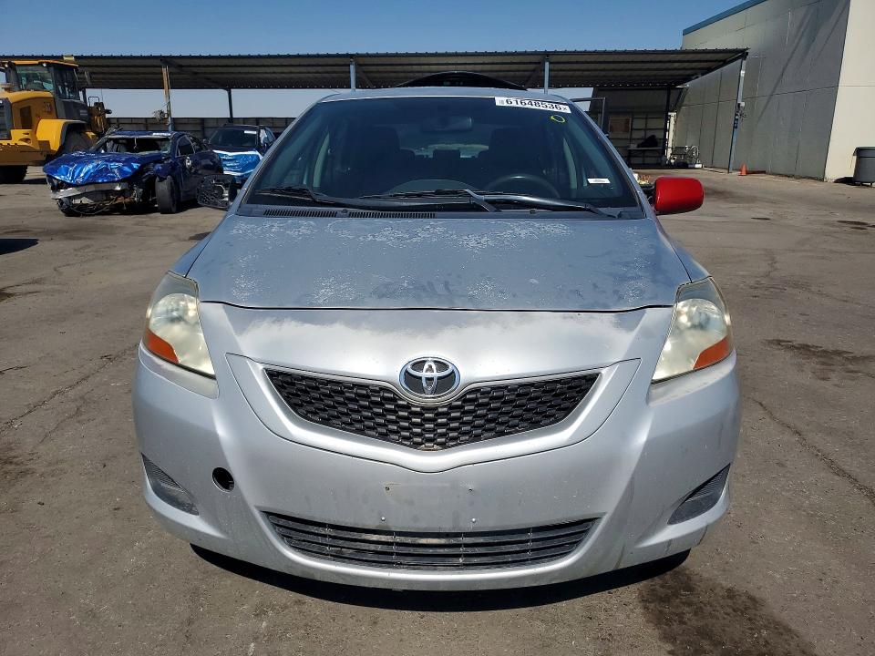 2009 Toyota Yaris VIN JTDBT903494053269 COPART salvage auction — MINOR DENT/SCRATCHES, Tx - Certificate Of Title, sold $325 on 2026-07-24 (photo 5)