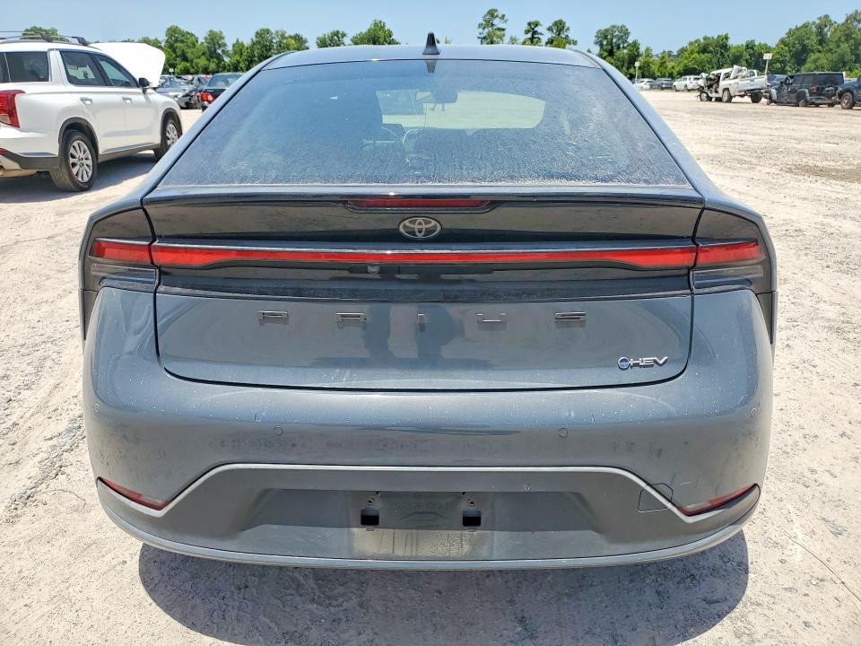 2023 Toyota Prius VIN JTDACAAUXP3009123 COPART salvage auction — WATER/FLOOD, Tx - Salvage Title-Flood Damage, sold $9,400 on 2026-08-18 (photo 6)