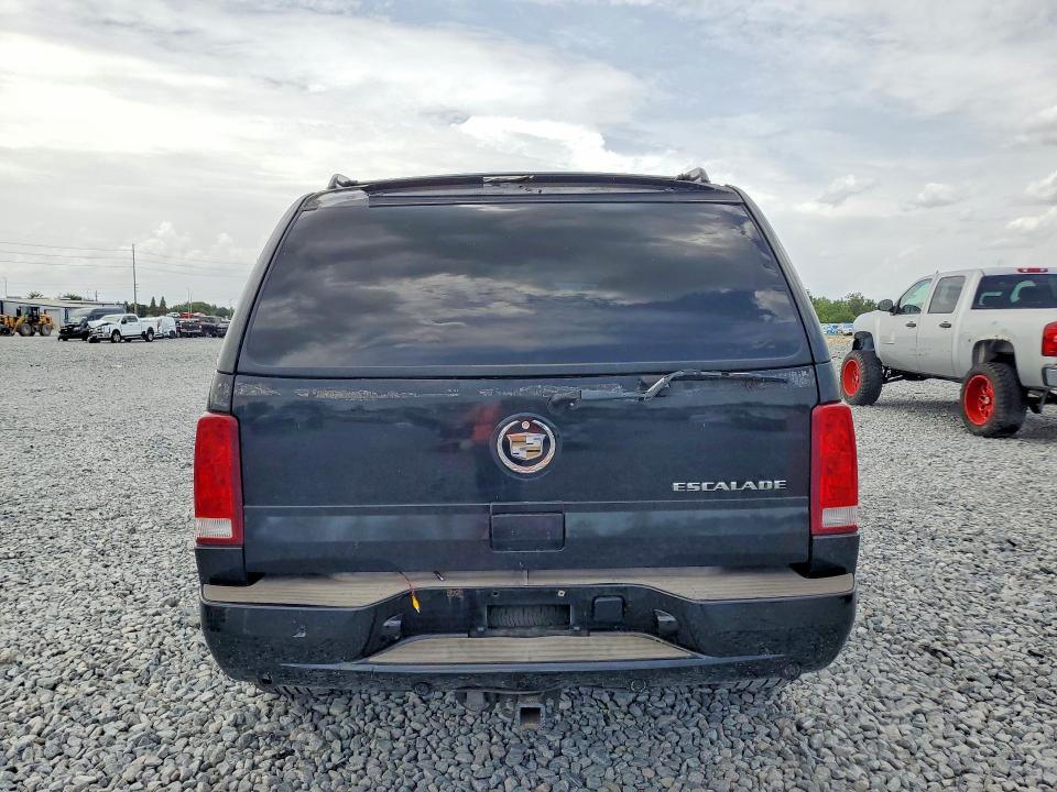 2004 Cadillac Escalade VIN 1GYEK63N34R265999 COPART salvage auction — MINOR DENT/SCRATCHES, FL - CERTIFICATE OF TITLE (P), sold $475 on 2026-07-29 (photo 6)