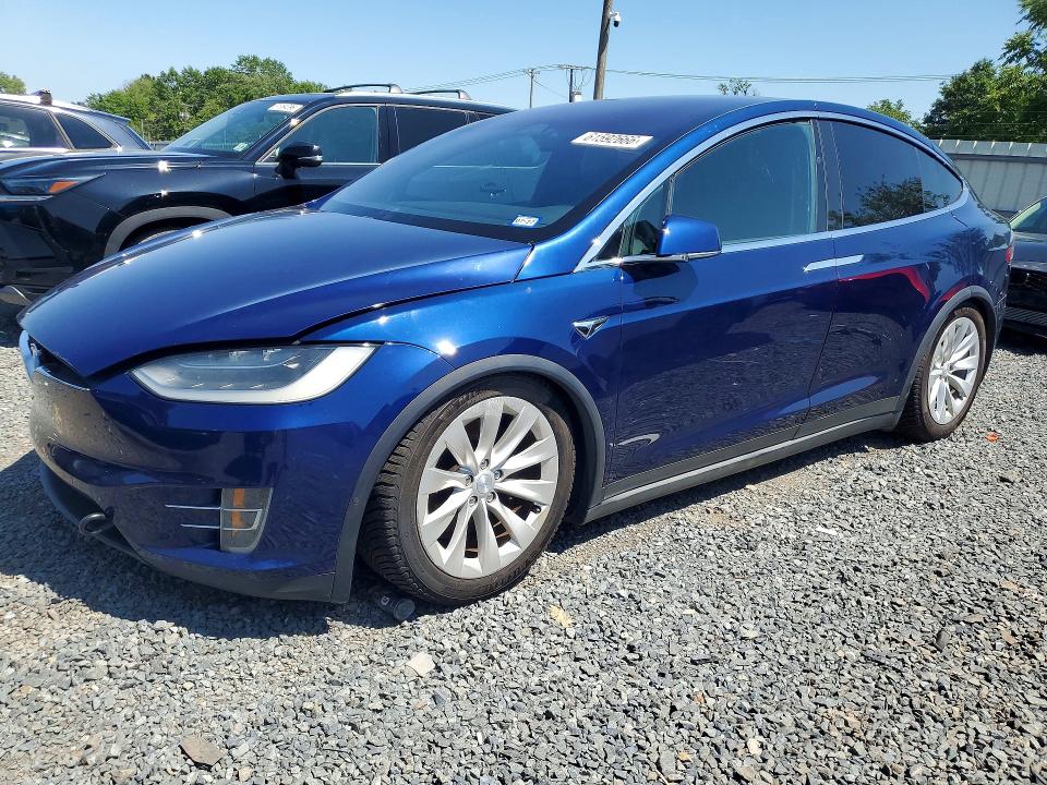 2017 Tesla Model x VIN 5YJXCBE24HF054703 COPART salvage auction — MINOR DENT/SCRATCHES, Tx - Certificate Of Title, sold $7,300 on 2026-07-31 (photo 1)