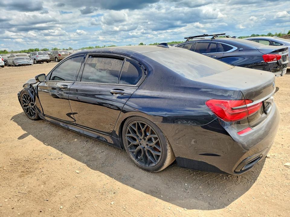 2017 BMW 7er VIN WBA7E4C57HGU99328 COPART salvage auction — SIDE, In - Certificate Of Title (P), sold $2,950 on 2026-08-13 (photo 2)