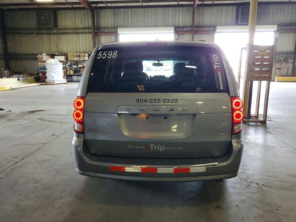 2019 Dodge Caravan VIN 2C4RDGCGXKR772656 COPART salvage auction — NORMAL WEAR, Fl - Cert Of Title-Taxi (P), sold $1,350 on 2026-08-03 (photo 6)