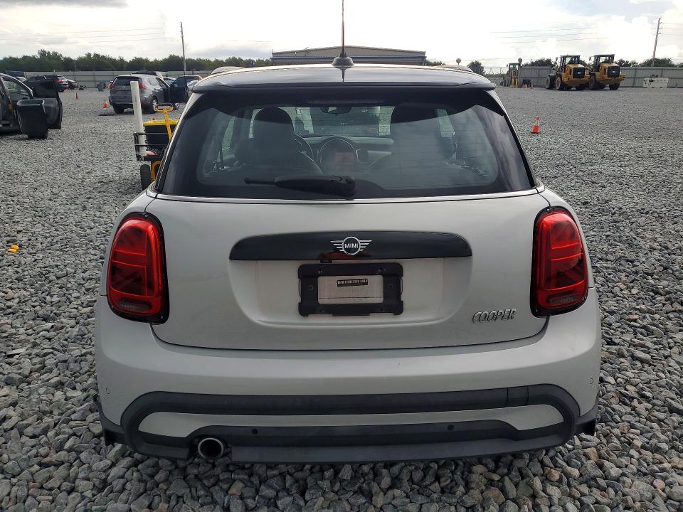 2022 Mini Cooper VIN WMW33DH04N2P90864 COPART salvage auction — SIDE, Fl - Cert Of Ttl-Rebuilt&Slvg Rbld, sold $10,100 on 2026-08-07 (photo 6)