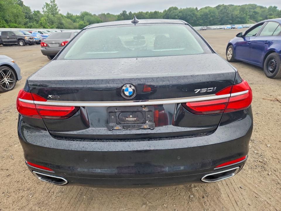 2016 BMW 7er VIN WBA7F2C52GG419238 COPART salvage auction — MINOR DENT/SCRATCHES, MA - CERTIFICATE OF TITLE, sold $4,150 on 2026-08-19 (photo 6)