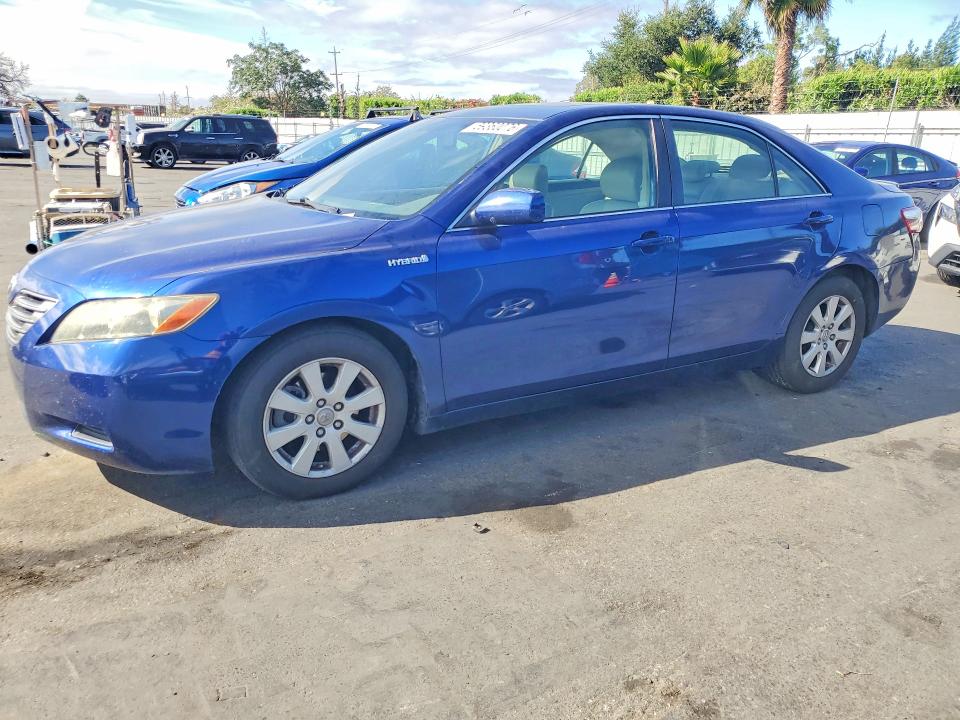 2007 Toyota Camry hybrid VIN JTNBB46K573027041 COPART salvage auction — MINOR DENT/SCRATCHES, Ca - Salvage Certificate, sold $825 on 2026-07-14 (photo 1)