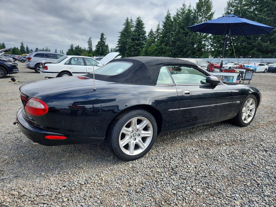 2000 Jaguar Xk series VIN SAJJA42CXYNA03622 COPART salvage auction — MINOR DENT/SCRATCHES, Wa - Cert Of Ownership-Rebuilt, sold $275 on 2026-07-21 (photo 3)