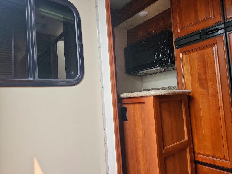 2014 Keystone VIN 4YDF34023E4701378 COPART salvage auction — BURN, MI - CERTIFICATE OF TITLE, sold $15,000 on 2026-09-21 (photo 6)