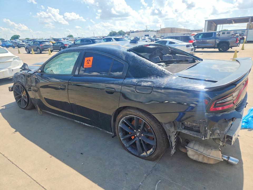 2023 Dodge Charger VIN 2C3CDXHG0PH512895 COPART salvage auction — ALL OVER, TX - CERTIFICATE OF TITLE, sold $1,500 on 2026-08-06 (photo 2)