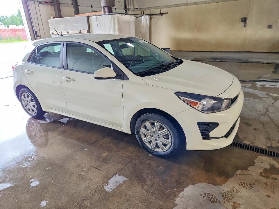 2023 Kia Rio VIN 3KPA25AD5PE613584 COPART salvage auction — NORMAL WEAR, AK - CERTIFICATE OF VEHICLE TITLE, sold $7,200 on 2026-07-28 (photo 4)