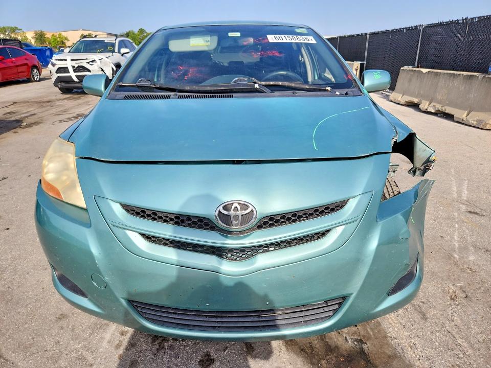 2007 Toyota Yaris VIN JTDBT923X71061193 COPART salvage auction — FRONT END, FL - CERT OF TITLE SLVG REBUILDABLE, sold $15 on 2026-07-23 (photo 5)