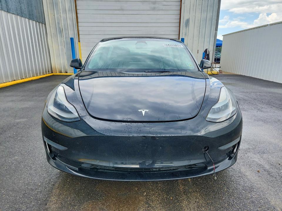 2022 Tesla Model 3 VIN 5YJ3E1EA9NF187673 COPART salvage auction — MECHANICAL, FL - CERTIFICATE OF TITLE, sold $5,100 on 2026-07-20 (photo 5)