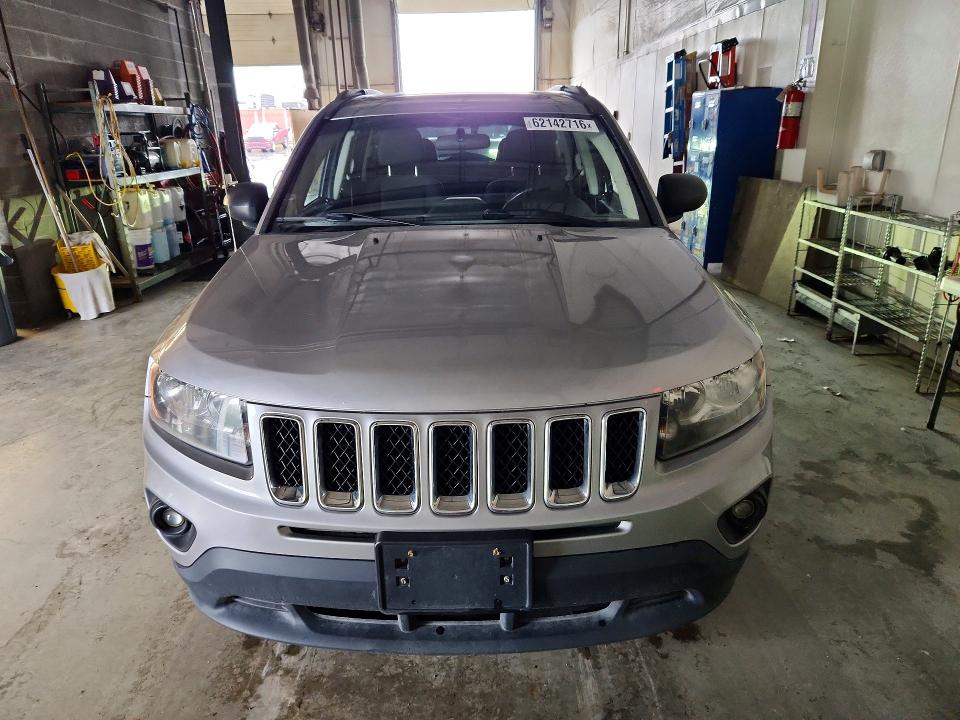 2014 Jeep Compass VIN 1C4NJDBB6ED780854 COPART salvage auction — NORMAL WEAR, Ak - Certificate Of Vehicle Title (P), sold $3,150 on 2026-08-04 (photo 5)