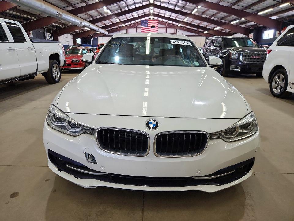 2017 BMW 3 series VIN WBA8B9G37HNU56381 COPART salvage auction — MINOR DENT/SCRATCHES, WV - CERTIFICATE OF TITLE (P), sold $2,400 on 2026-07-17 (photo 5)