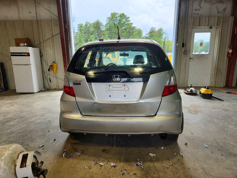 2012 Honda Fit VIN JHMGE8H38CS002129 COPART salvage auction — MINOR DENT/SCRATCHES, VA - CERT OF TITLE - SALVAGE, sold $200 on 2026-07-28 (photo 6)