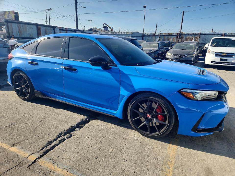 2024 Honda Civic VIN JHMFL5G44RX095432 COPART salvage auction — MINOR DENT/SCRATCHES, Ak - Dis/Dlr/Exp Only Clean Title, sold $28,500 on 2026-07-27 (photo 4)
