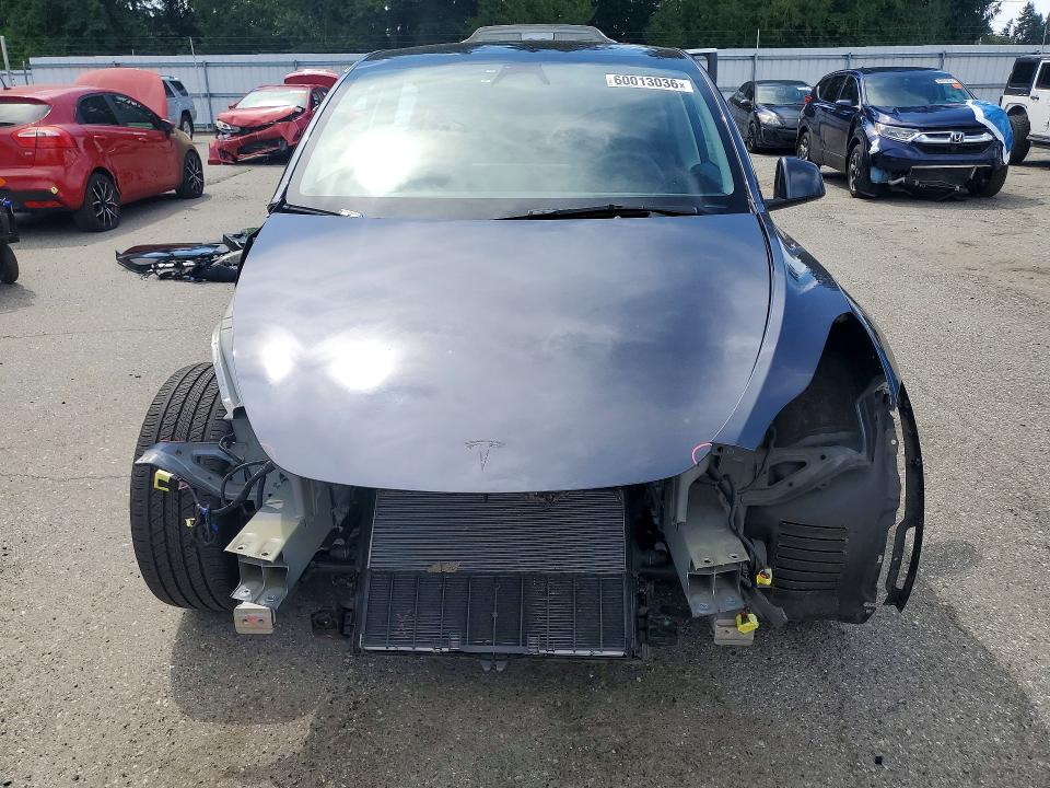 2023 Tesla Model y VIN 7SAYGAEE9PF971523 COPART salvage auction — FRONT END, Wa - Bill Of Sale, sold $13,400 on 2026-07-20 (photo 5)