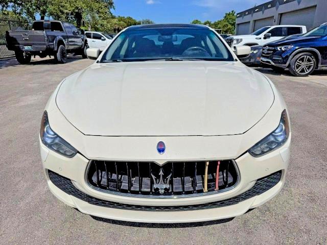 2014 Maserati Ghibli VIN ZAM57RTA9E1086058 COPART salvage auction — MINOR DENT/SCRATCHES, In - Certificate Of Title (P), sold $5,400 on 2026-08-04 (photo 5)