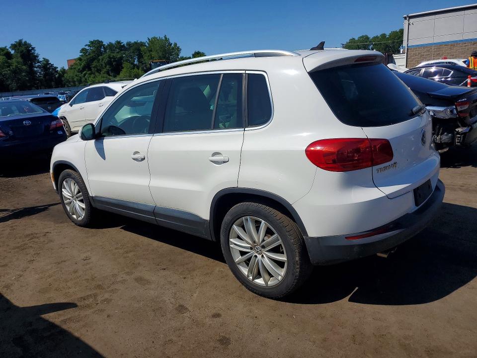 2014 Volkswagen Tiguan VIN WVGBV3AX2EW523382 COPART salvage auction — MINOR DENT/SCRATCHES, Ct - Certificate Of Title, sold $800 on 2026-07-28 (photo 2)