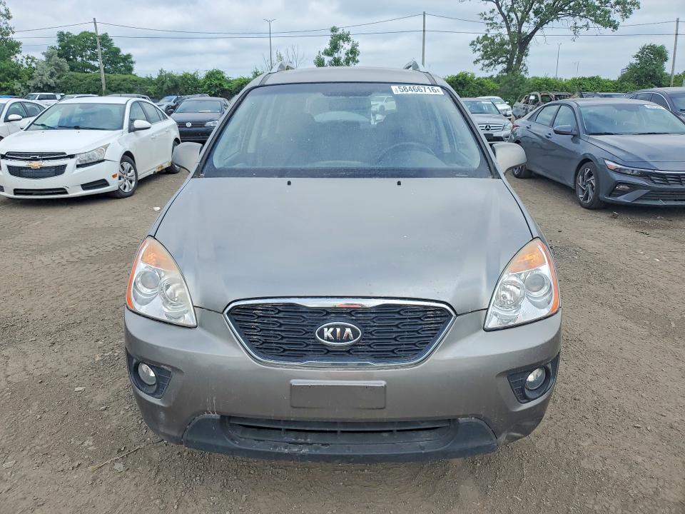 2012 Kia Rondo VIN KNAHH8C83C7379144 COPART salvage auction — SIDE, Qc - Gravement Accidente, sold $575 on 2026-07-28 (photo 5)