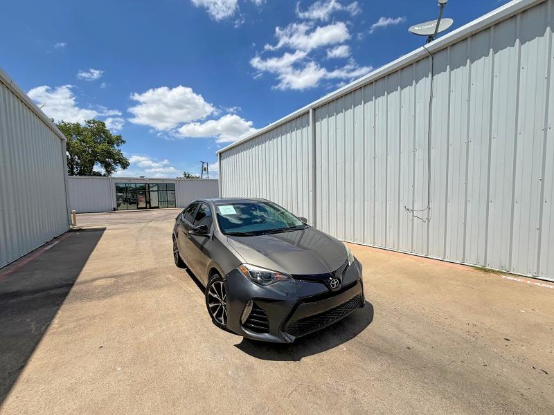 2017 Toyota Corolla VIN 5YFBURHE0HP631432 COPART salvage auction — MINOR DENT/SCRATCHES, Tx - Certificate Of Title (P), sold $3,450 on 2026-07-16 (photo 1)