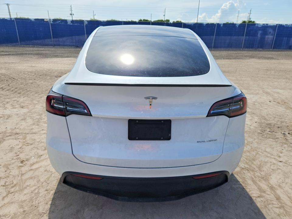 2023 Tesla Model y VIN 7SAYGDEE5PA092096 COPART salvage auction — FRONT END, Fl - Cert Of Title Slvg Rebuildable, sold $13,600 on 2026-07-15 (photo 6)